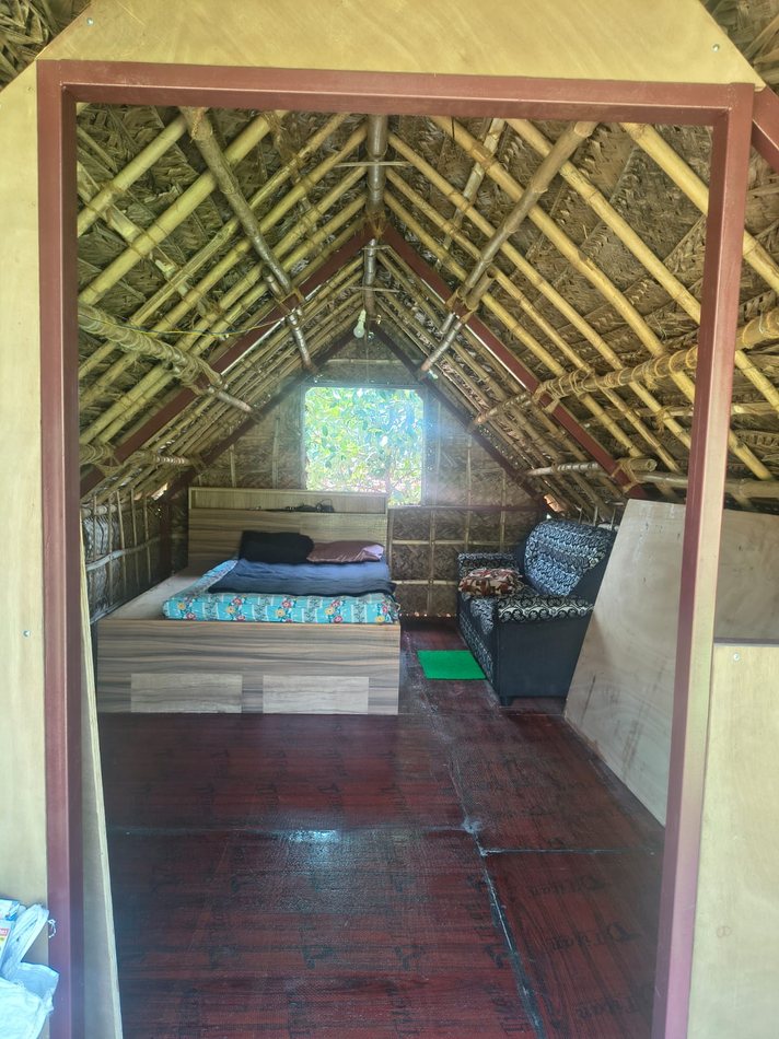 Bamboo eco house entrance view — bamboo ceiling structure