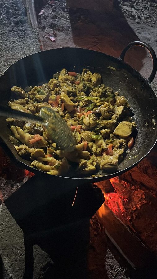 Nattu Koli cooking on wood fire